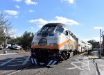 The Sunrail train heads away from WPK station toward its next stop of AventHealth 